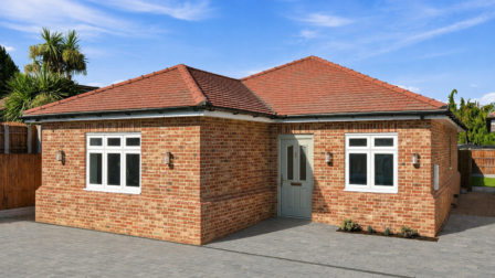 Front elevation of Plot 1, a detached three bedroom red brick bungalow with a tiled roof and block paved driveway, at Luna Close, Upminster